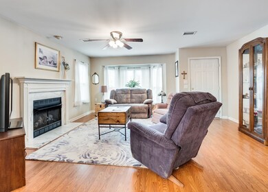 Living room with gas burning fireplace.