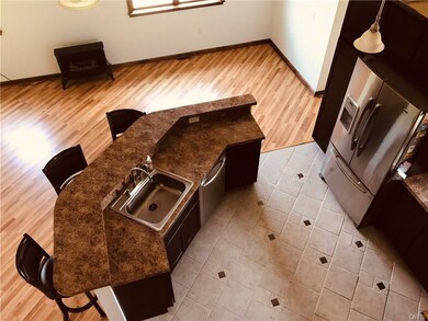 View of kitchen from loft