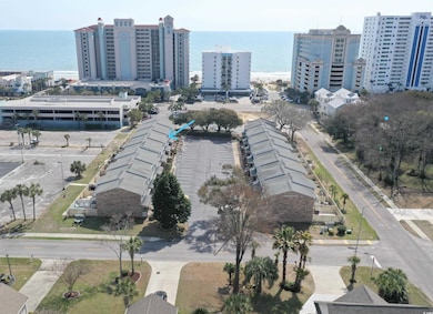 Birds eye view of property with a view of city and