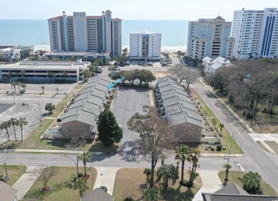 Birds eye view of property with a view of city and a water view