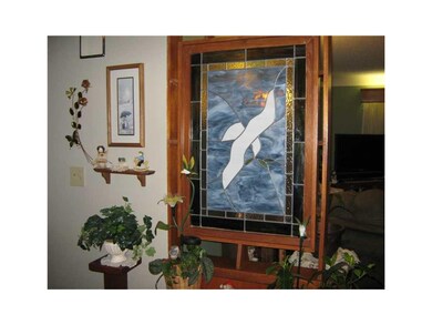 Foyer. Entrance with stainglass art.
