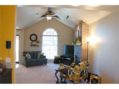 Living Room. Vaulted ceiling and large arched wind
