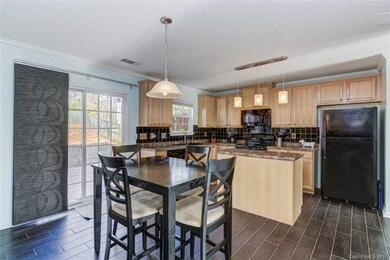 Open Plan with Kitchen Island.  Pendant Lighting.