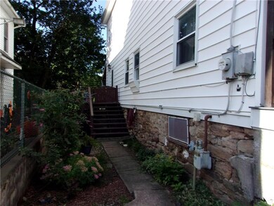 Side gardens and access to rear deck