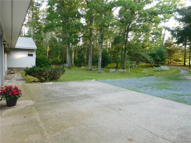 Winding, private lane leads you home. Front yard v