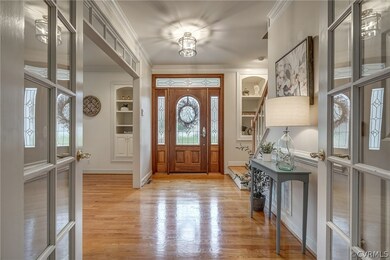 Glass-paned French Doors offer an elegant touch an