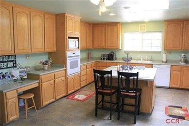 Beautiful kitchen with plenty of cabinets and pant