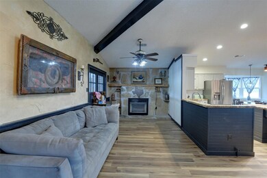 Formal Living room (or flex space) with a fireplac