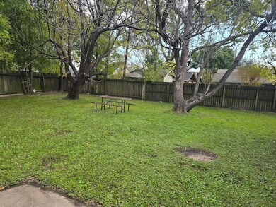 The backyard is an entertainer's dream, complete w