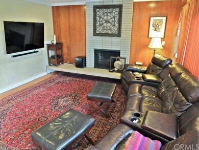 Large family room with fireplace, wired for sound 