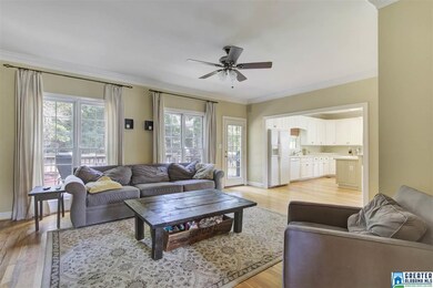 Open to the kitchen and has access to the back dec
