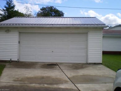Two+ garage with electric door.