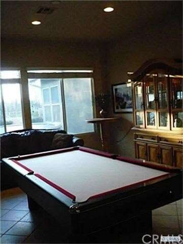 Living room is being used as a game room