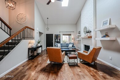 LIVING ROOM SHOWING VALTED CEILING AND S