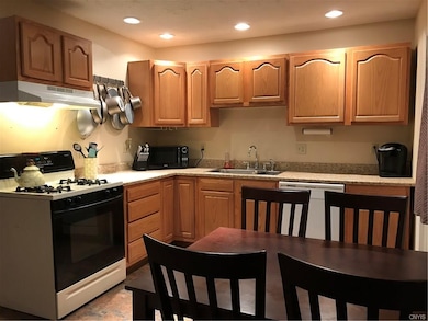 Bright kitchen offers enough room for a dining tab