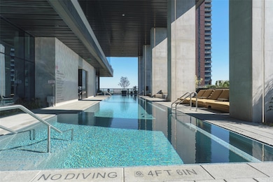 Community pool featuring a patio area