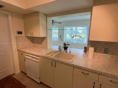 Kitchen has convenient pass through to family room for entertaining and conversation.