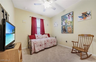 Bedroom featuring carpet floors and a ceiling fan