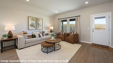 Living area with recessed lighting, wood finished floors, and lofted ceiling