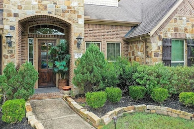 Charming home entrance featuring a rustic wooden d