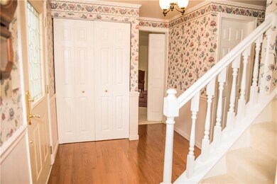 Spacious entryway with large coat closet and gorge