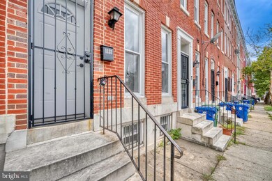 1131 N Mount St, Baltimore, MD 21217 - photo 2