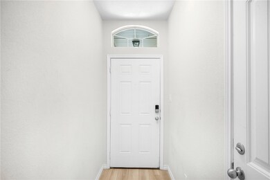 Entryway featuring light wood finished floors and