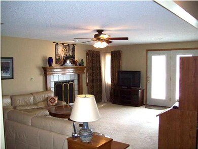 Family room, 2nd fireplace. French doors to patio,