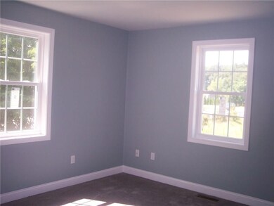 spacious master bedroom with walk-in closet and fu
