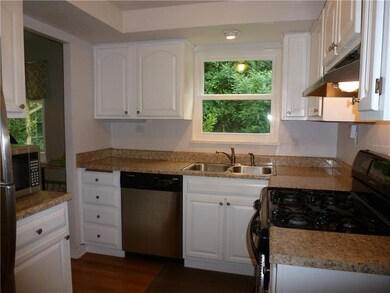 Kitchen with newer counter tops & stainless steel 