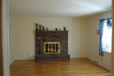 Wood burning fireplace in the Family room right of