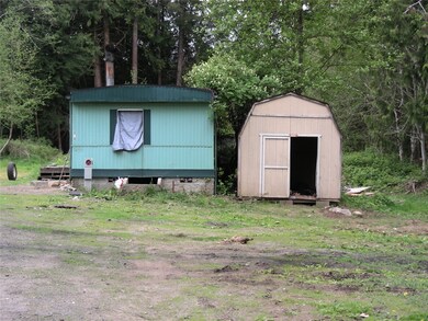 Both homes are fixers, the single wide is in better shape.