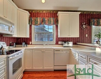 Kitchen. Spacious Kitchen With Beautiful Hardwood 