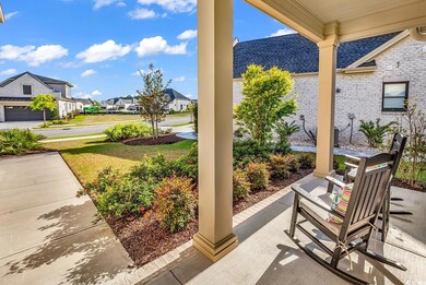View of patio / terrace with a porch and a residen