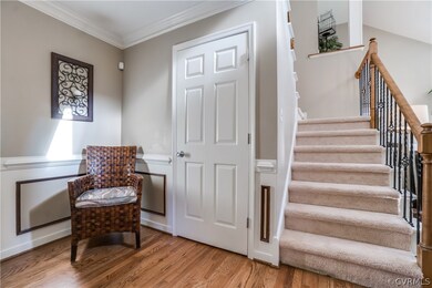 Great space in this wide foyer...wood floors and c