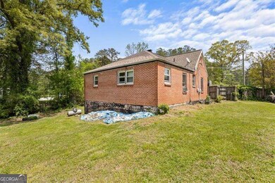 3813 Stonewall Tell Rd, Atlanta, GA 30349 - photo 4