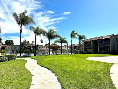 Greenery is not lacking! Peaceful walking paths around this beautifully landscape community