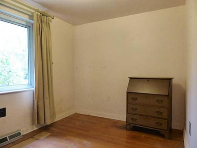 Bedroom. Both bedrooms w/ hardwood floors.