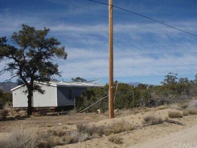 Manufactured home is on a tag-a-long trailer (2).
