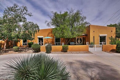 8622 E Joshua Tree Ln-small-001-37-Front