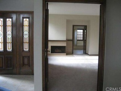 Entry into master suite with fireplace