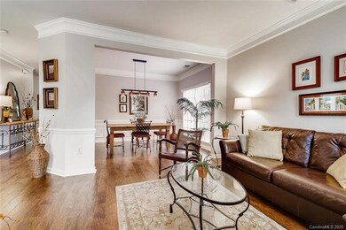 Living room is open to the dining area, perfect fo