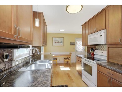 Enjoy in-kitchen dining and wood flooring.