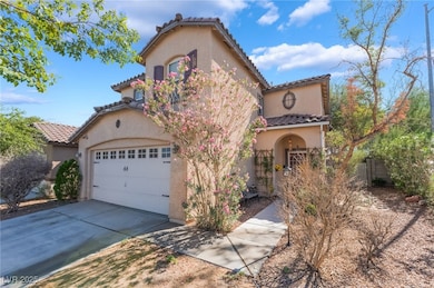Mediterranean / spanish-style house featuring a tiled roof, a garage, concrete driveway, and stucco siding