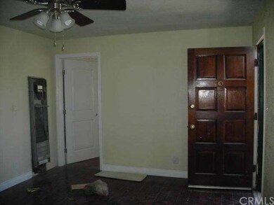 LIVING ROOM WITH WALL HEATER