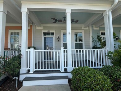 View of exterior entry featuring a porch