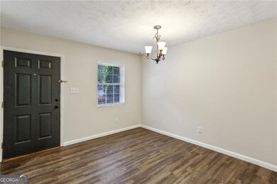 View of front door from dining area