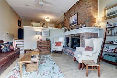 Living Room with Brick Fireplace