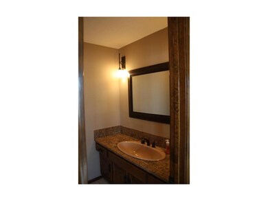 Half bath off of kitchen.