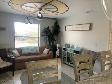 Tiled living room with a wealth of natural light